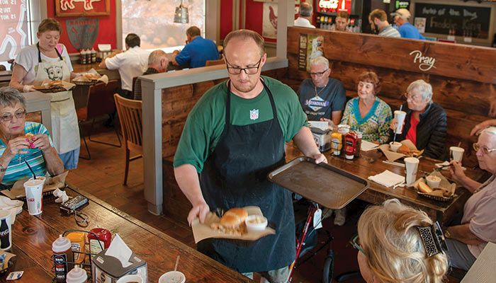 Moo’s celebrates pork and other Iowa meats, as wells as blues music, at its restaurant just off I-80. 