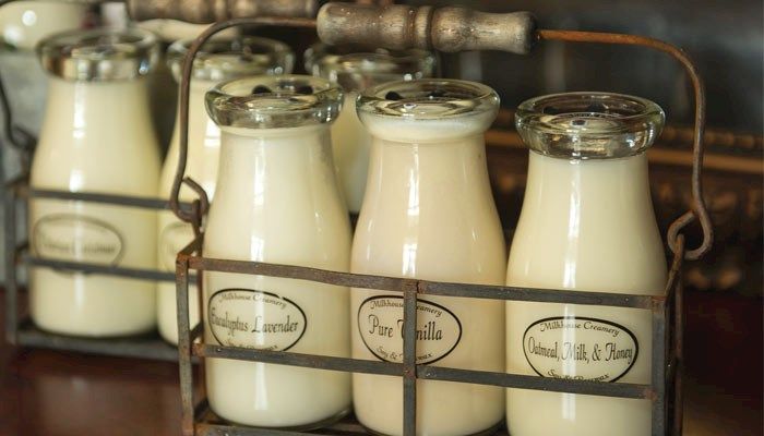 Milkhouse Candle Co., based in Osage, sells soy wax candles in its signature milk bottle-style glass containers. The candles are sold in retail stores across the United States and internationally.