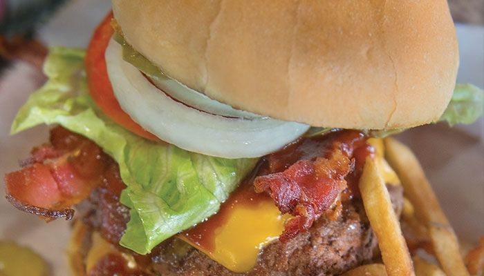 The Chuckwagon's burgers are 6-ounce, hand-pattied Angus beef and prepared on a flat-top grill using their own house seasoning. 