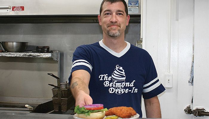 Joe McFarland serves up his award-winning pork tenderloins at the Belmond Drive-In in Belmond, a popular stop on the Tenderloin Trail. The Belmond Drive-In was the 2015 winner of the Iowa Pork Producer Association's annual best tenderloin contest.