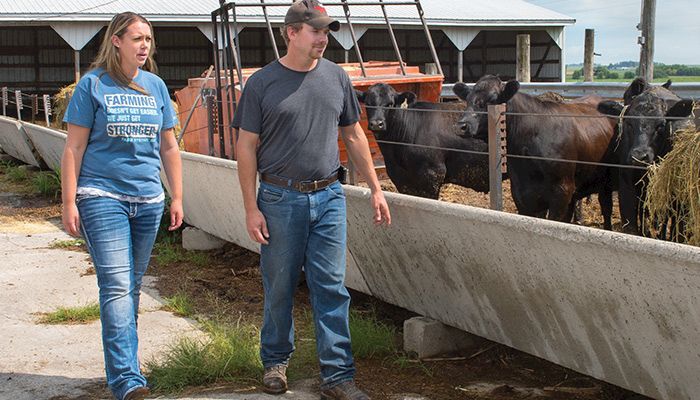 Laura and Aaron Cunningham of Nora Springs check on their cattle.