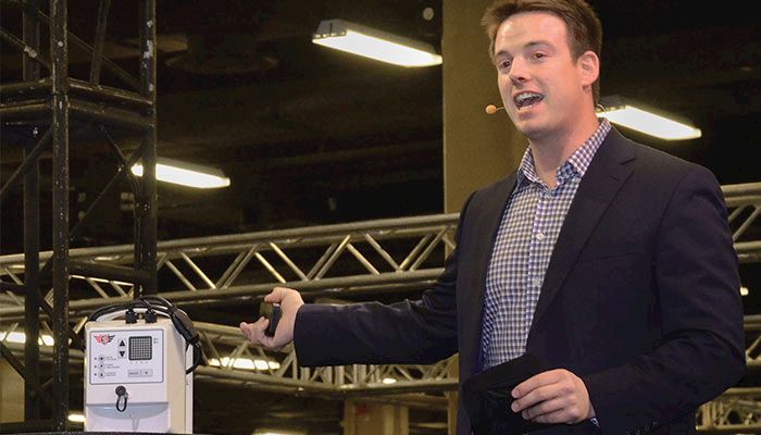 Matthew Rooda, co-founder and CEO of SwineTech, shows off his company’s technology during the American Farm Bureau’s Rural Entrepreneurship Challenge. 