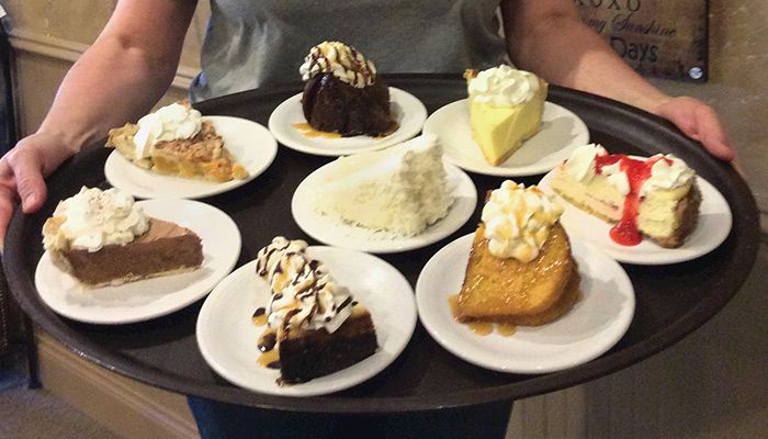 Farm Bureau member Mary Meyer shows off her array of award-winning desserts available at the Peppercorn Pantry in Aplington. The family's tea room and gift shop are also receiving rave reviews.