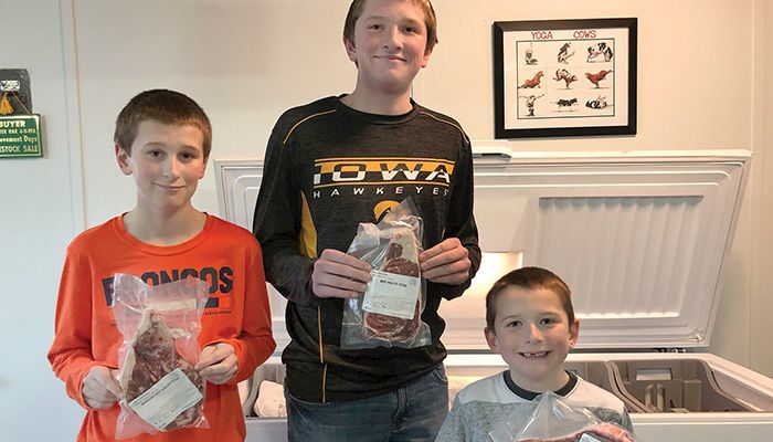 The Gress boys — Peyton, Dawson and Teagan — help on their family's beef farm in Charter Oak. The family started Vintage Beef, selling their Iowa-raised beef directly to consumers.