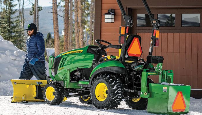 JD tractor snow plow