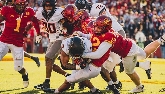 Iowa Farm Bureau and Iowa State Athletics ‘tackle’ hunger with $15,000 donation to on-campus food pantry