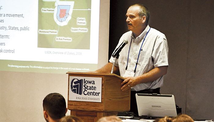 Jeff Kaisand, Iowa’s state veterinarian, leads an exercise to inform hog farmers and industry partners how to respond to a foreign animal disease outbreak.