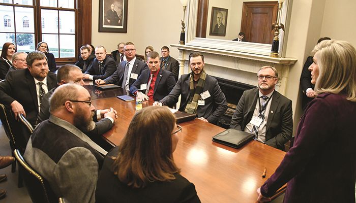 Senator Joni Ernst talks with Farm Bureau members