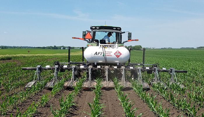 More farmers are using propane-powered flame weeders to help control weeds in growing crops