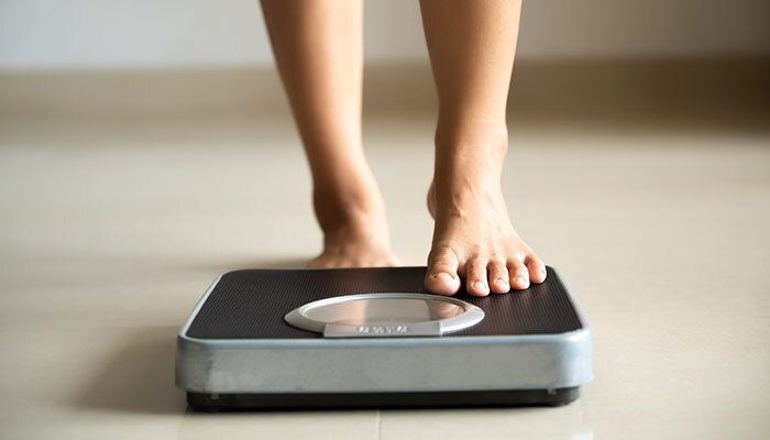 stepping on a scale