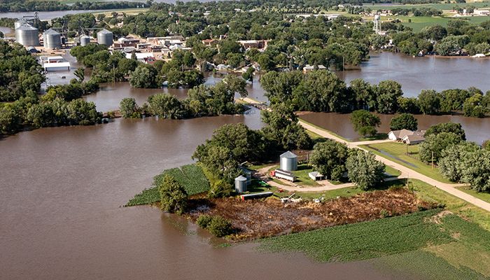 Heavy rains, overflowing streams flood NW Iowa fields 