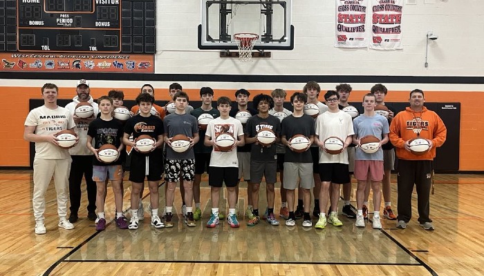 Madrid High School Boys Basketball team presented with basketballs