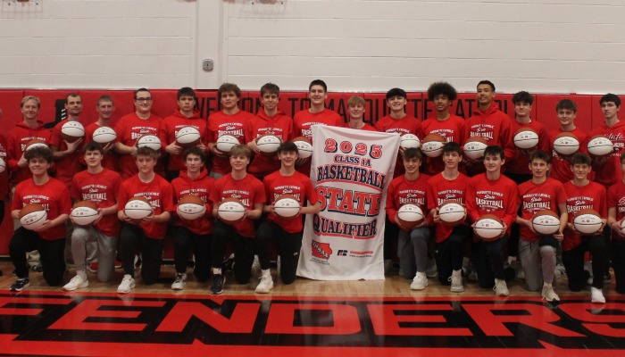 Basketballs presented to Marquette Catholic