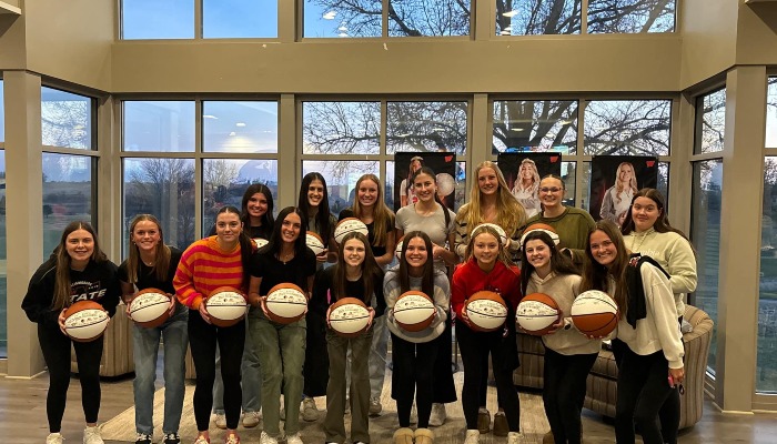 Basketballs presented to Williamsburg Raiders