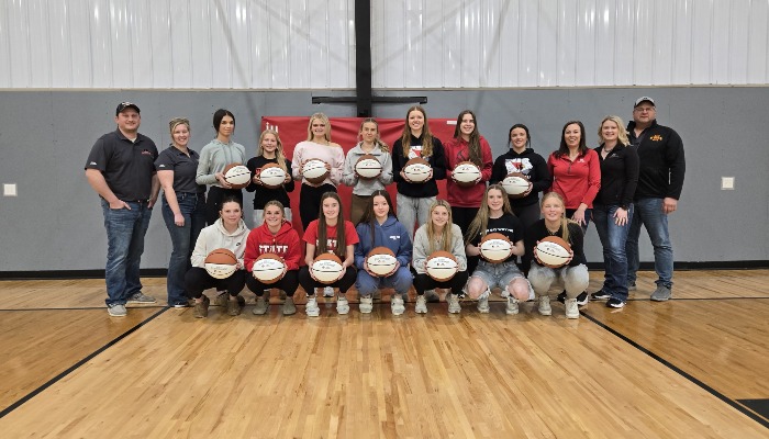 Basketballs presented to Maquoketa 