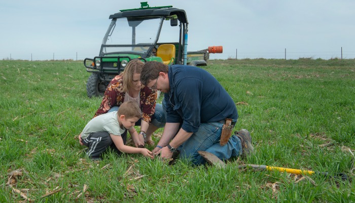 Mike Jackson and family in field of cover crops