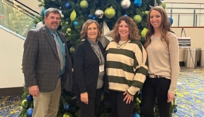 Holliday attends County Employee Conference