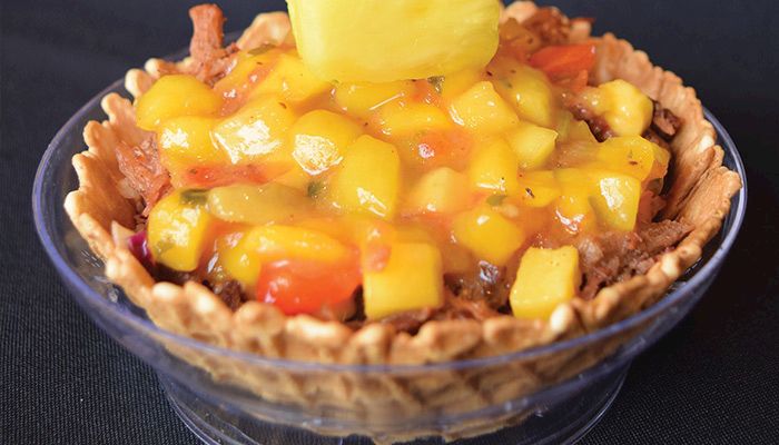 The Cattlemen's Beef Quarters at the Iowa State Fair will offer a new twist on fair food this year with the Brisket Tango Mango, a waffle bowl filled with coleslaw, shredded smoked brisket and mango salsa.