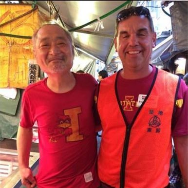 Japanese fish market vendor wearing Iowa State Cyclones shirt