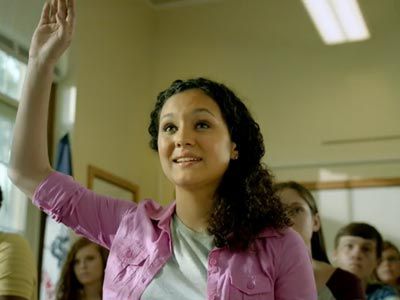 Student raising their hand.